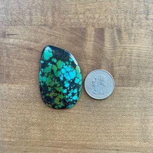 Turquoise Cabochon set in Leather Service